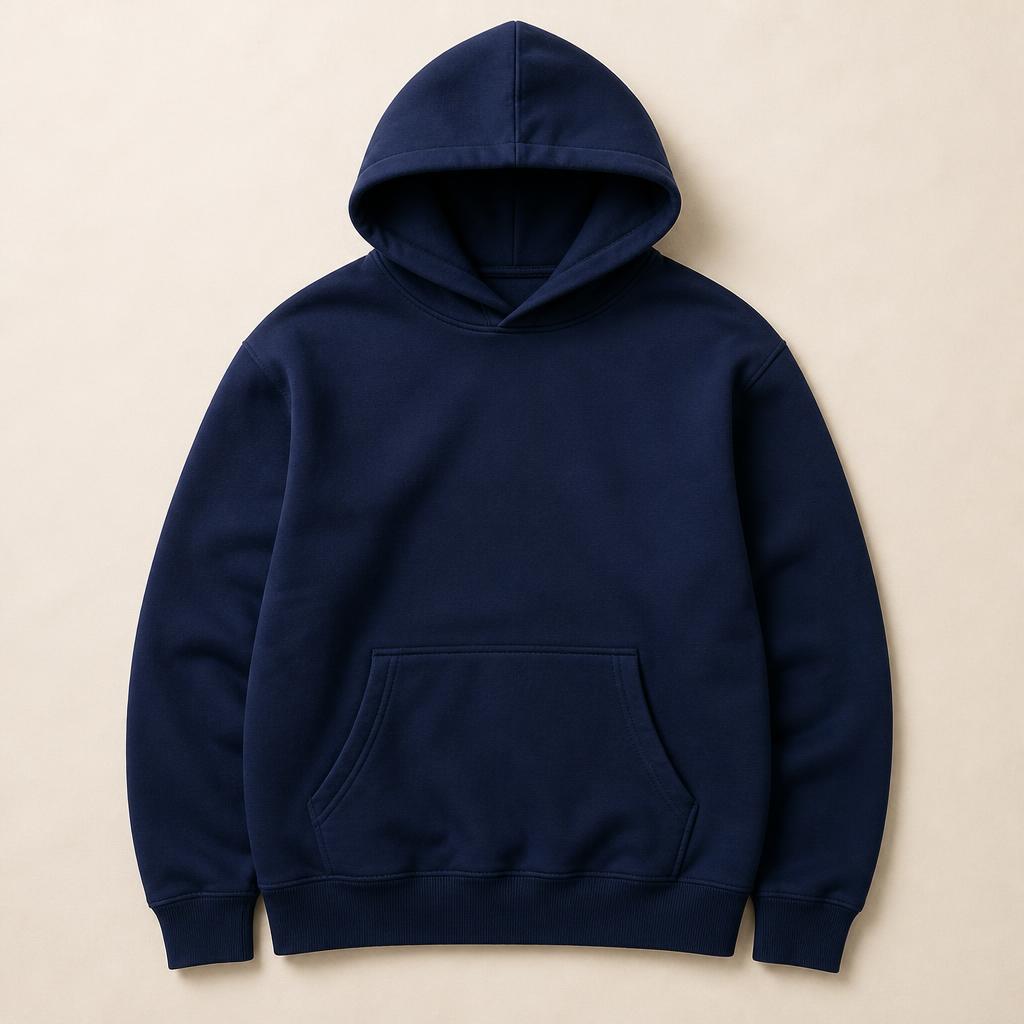Good Kit Premium Hoodie — Navy premium hoodie laid flat on a cream studio background