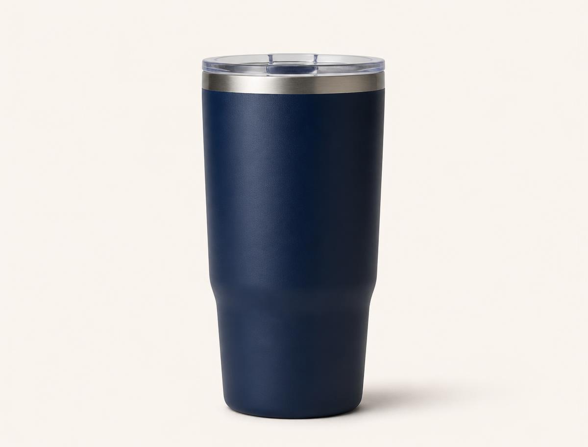 Good Kit Insulated Tumbler — Navy insulated stainless steel travel tumbler on a cream background